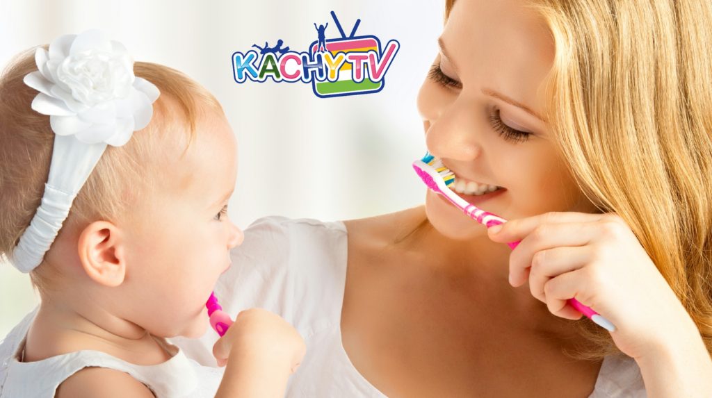 How do you teach kids to brush teeth?